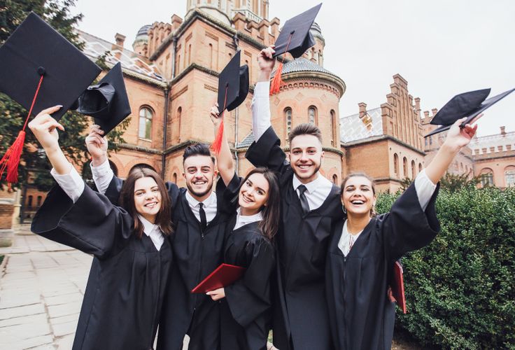 A focused student studying at a desk with books, indicating academic support